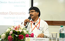 Dr. Vivekanand G Dean Research moderating a panel discussion